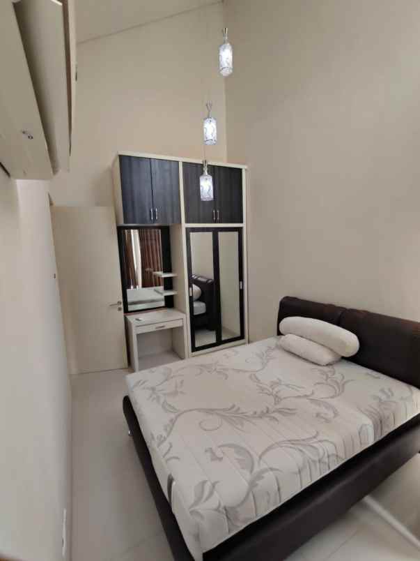 rumah pakuwon city zimbali costa row jalan 2 mobil