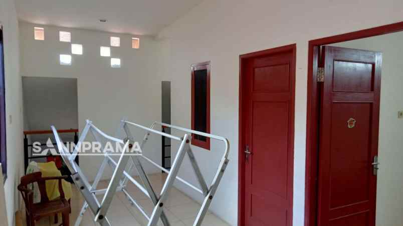 rumah second dekat polsek pancoran mas rohkus