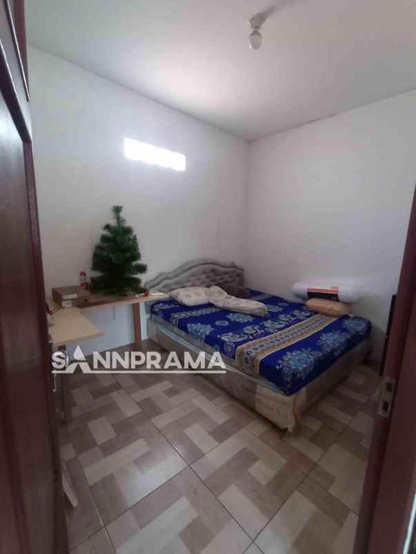 rumah second dekat polsek pancoran mas rohkus