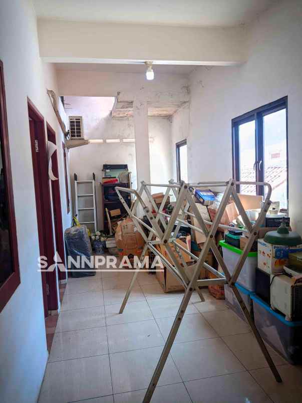 rumah second dekat polsek pancoran mas rohkus