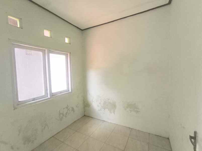 rumah second lokasi dekat bandara siap huni