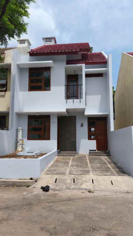 dijual rumah cluster madany regecy