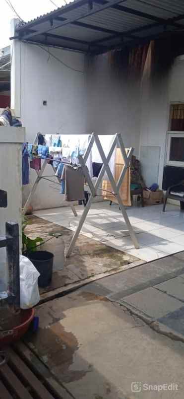 dijual rumah district orange residence