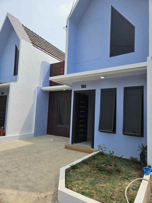 dijual rumah jalan raya tugu macan