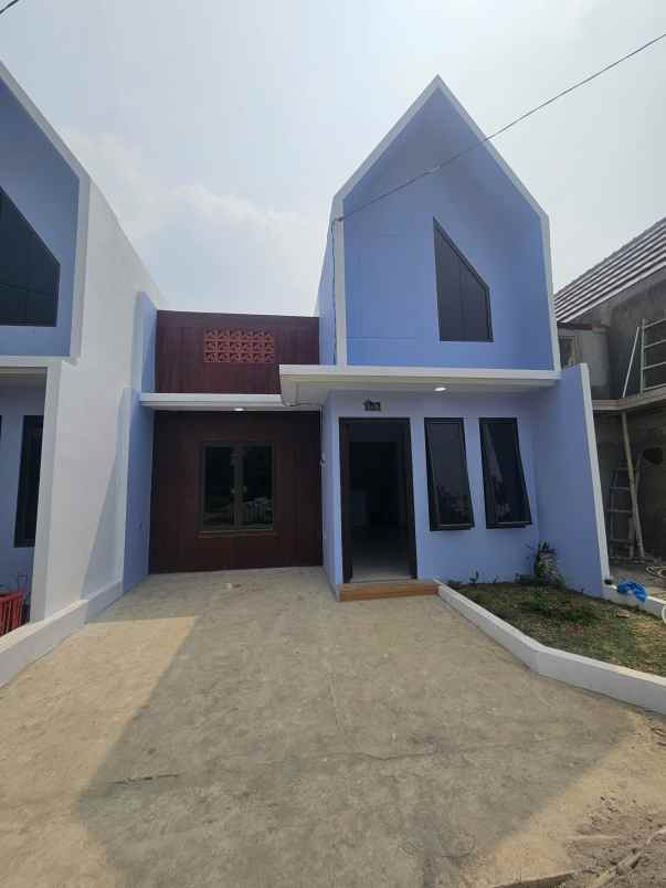dijual rumah jalan raya tugu macan