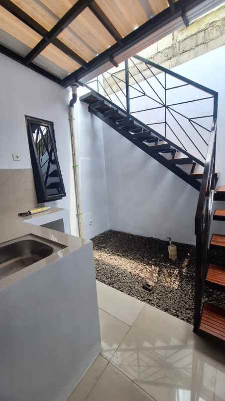 dijual rumah jalan raya tugu macan