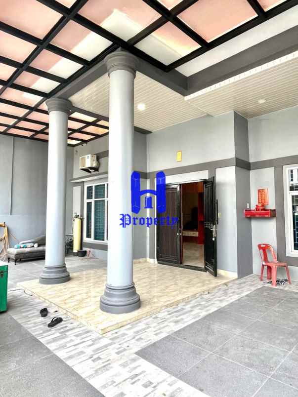 dijual rumah komplek graha metropolitan