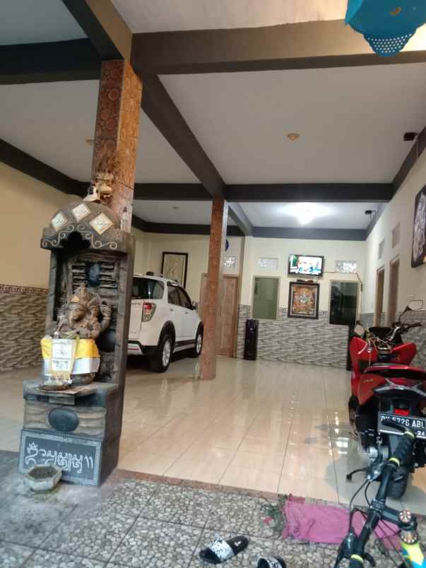 jual rumah di monang maning parkir 2 mobil