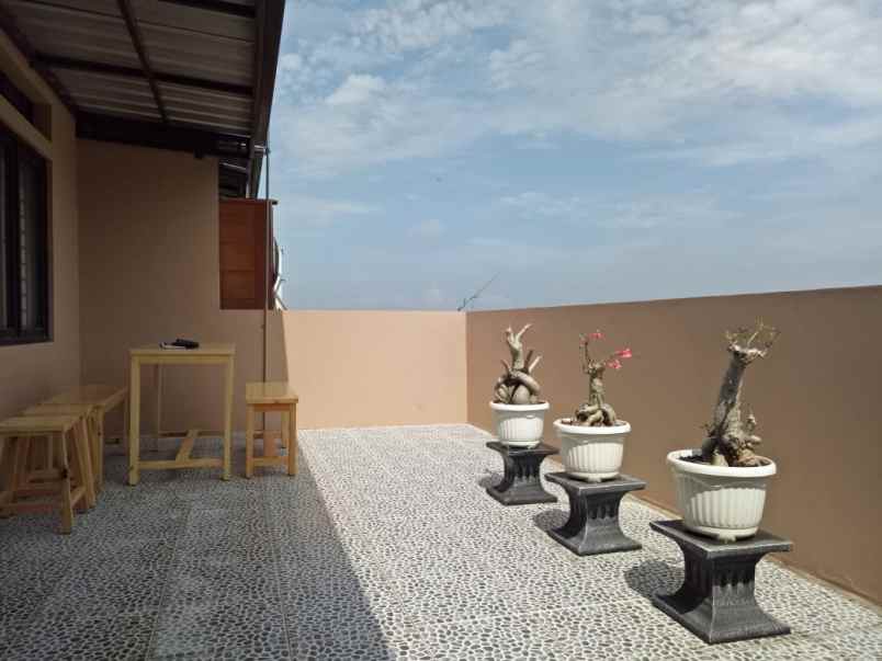 rumah minimalis ciwaruga siap huni row jalan besar