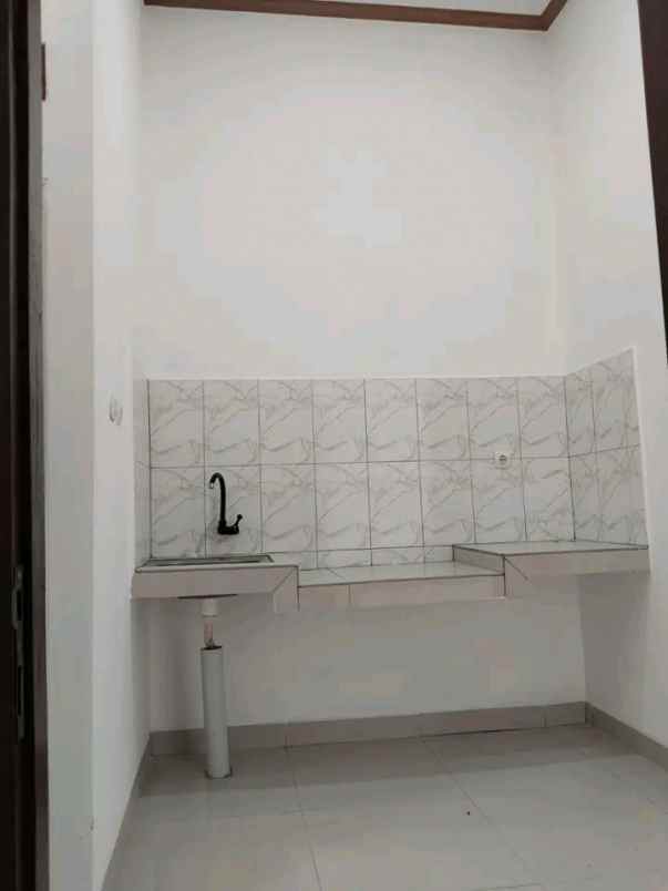 rumah minimalis harga 130 jt akses masuk mobil