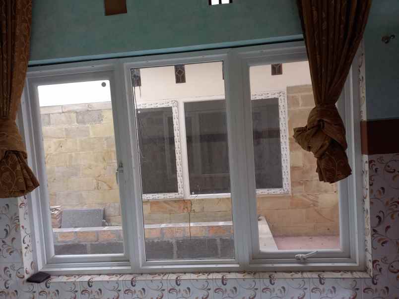 rumah strategis 2 lantai wahidin shm jalan utama