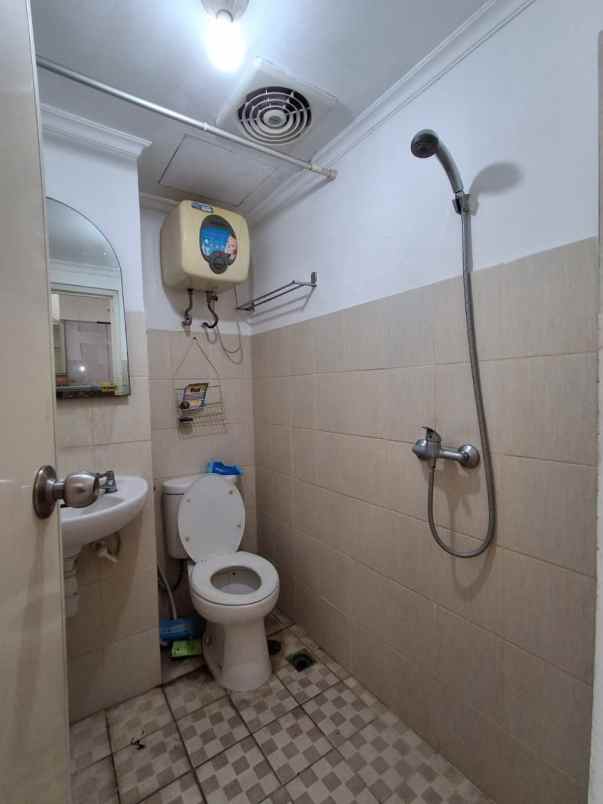 apartemen puncak permai tower c lantai 17 connecting