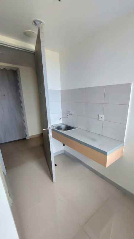 dijual apartemen jl raya boulevard osaka