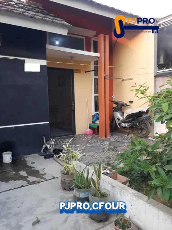 dijual rumah cluster land gardens