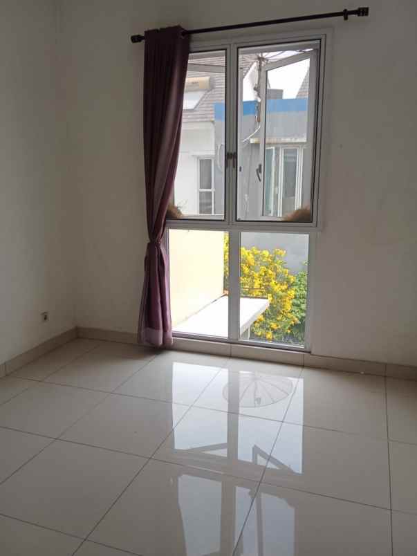 dijual rumah cluster palm spring jgc