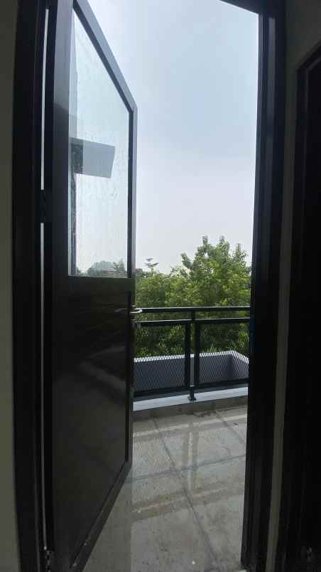 dijual rumah jalan raya pamulang dekat