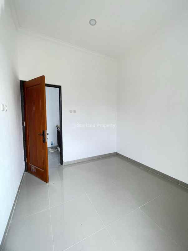 dijual rumah jalan raya pamulang dekat