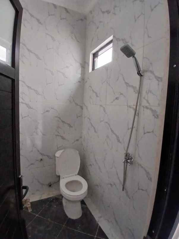 dijual rumah jln raya jatimulya depok