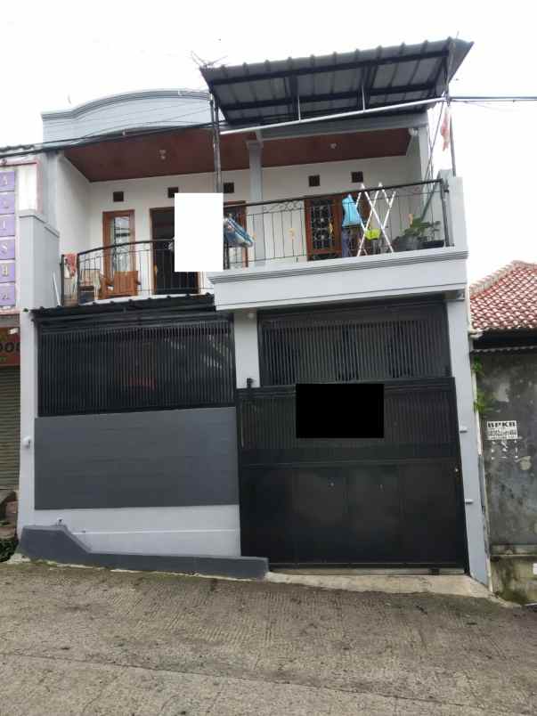 dijual rumah komplek sariwangi