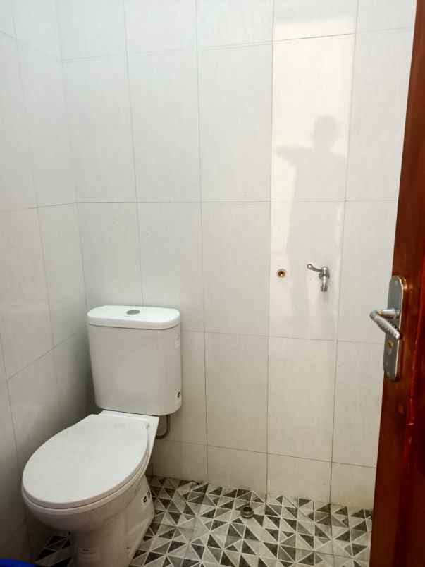 dijual rumah komplek sariwangi