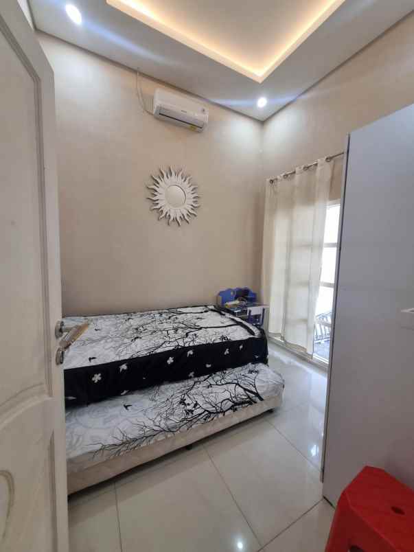 dijual rumah pakuwon city