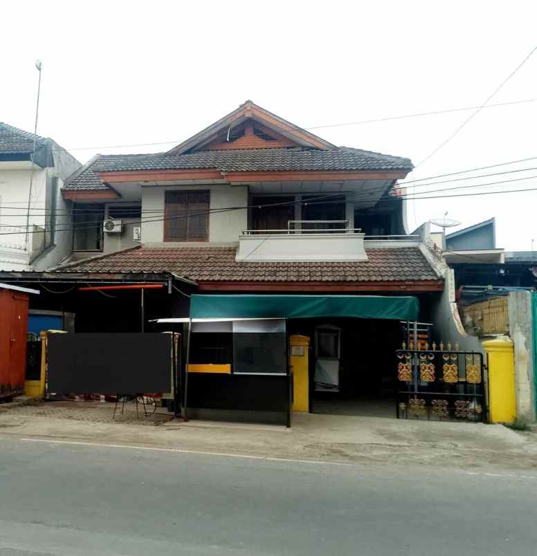 dijual rumah pinggir jalan raya malaka