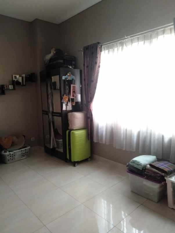 jual rumah siap huni raffles hills cibubur