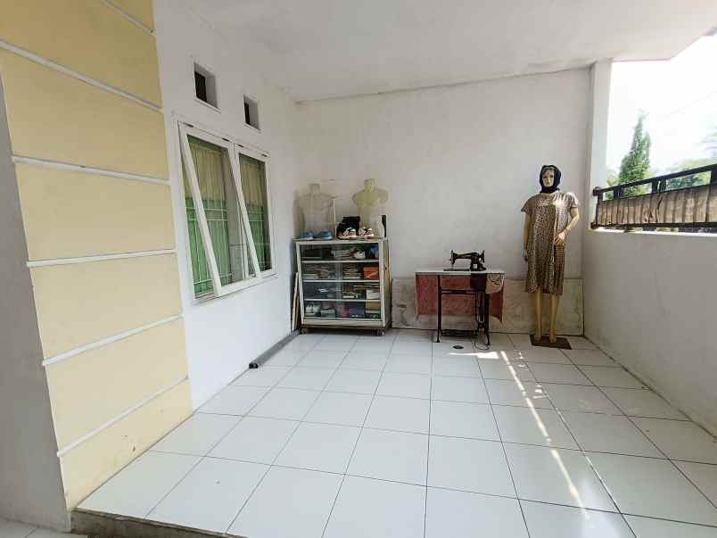 over kredit rumah taman mutiara indah 2