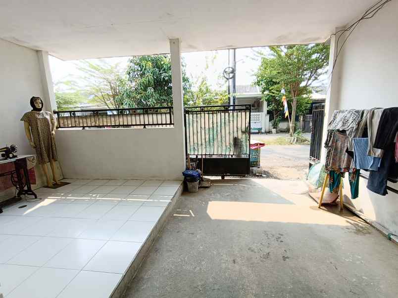 over kredit rumah taman mutiara indah 2