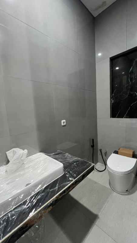 rumah besar minimalis pakuwon city grand island