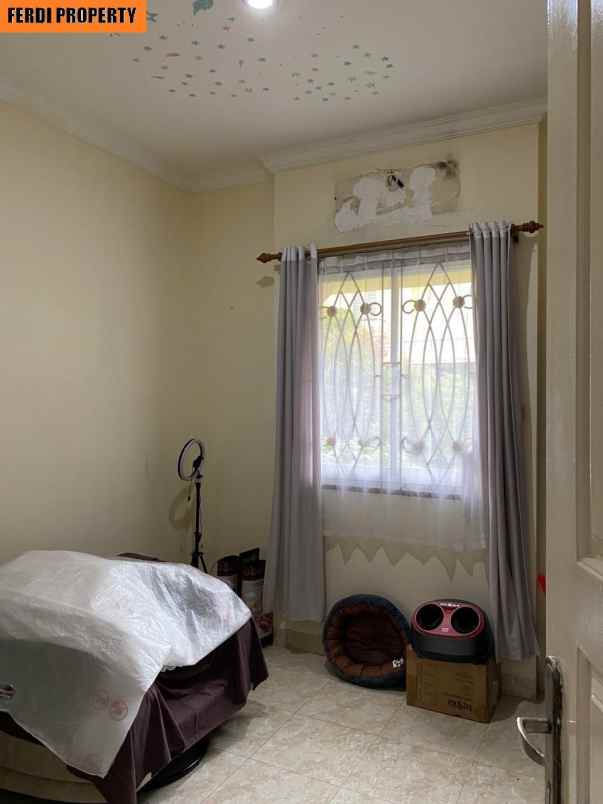 rumah canti 2 lantai raffles hills cibubur