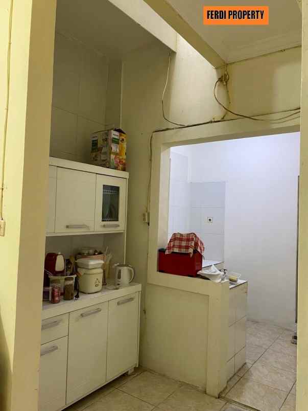 rumah canti 2 lantai raffles hills cibubur