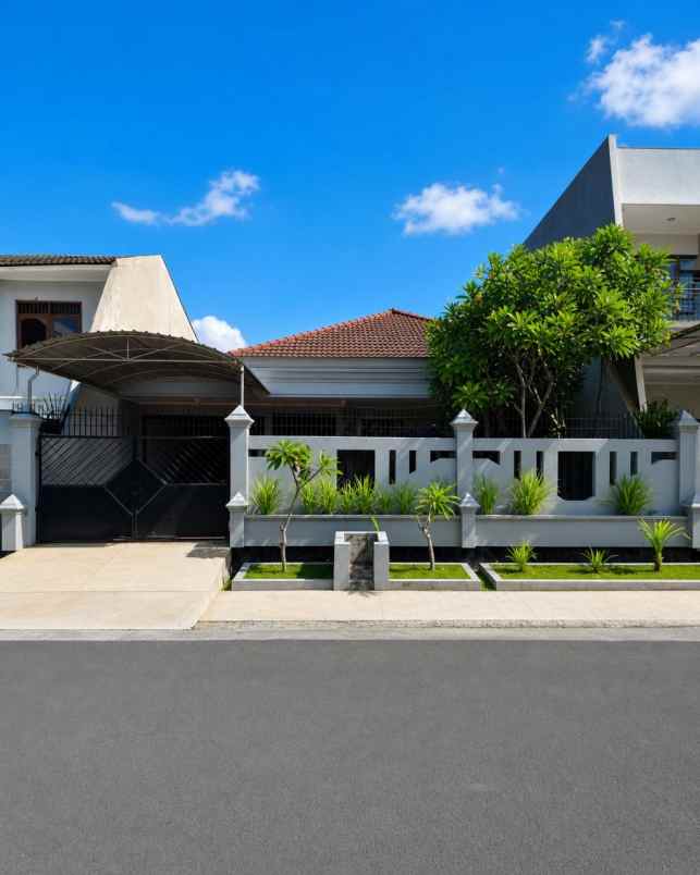 rumah dharmahusada indah strategis row 3 mobil 4 75m