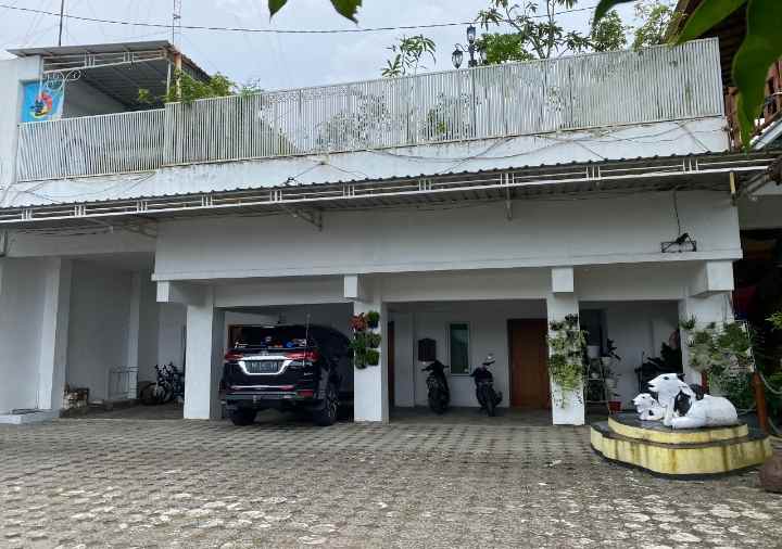 rumah jalan sidokarto area sawah