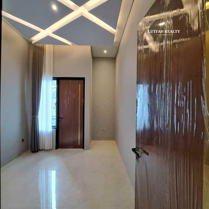 rumah modern kontemporer dalam cluster