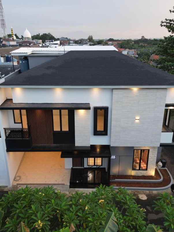 rumah modern kontemporer dalam cluster