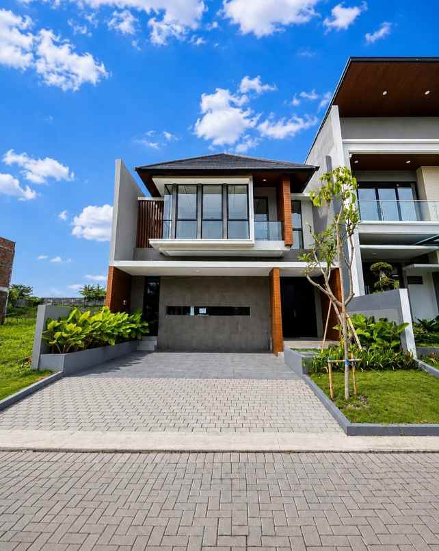 rumah woodland citraland new minimalis row 15 meter