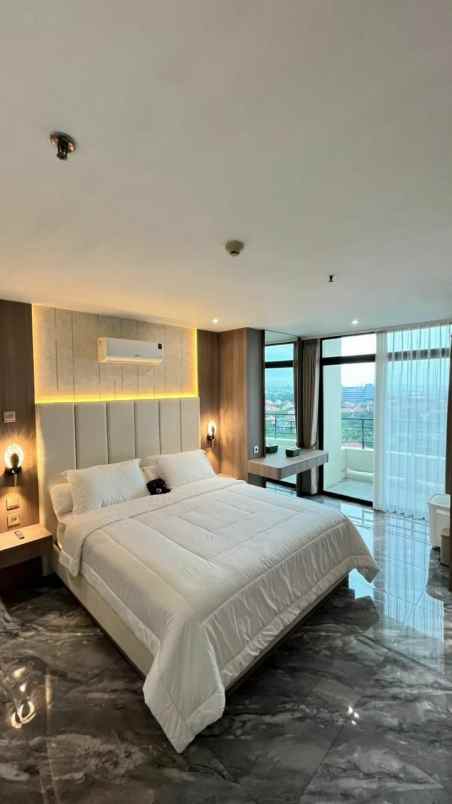 dijual apartemen graha family wiyung