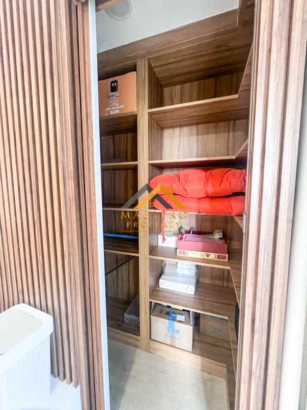 dijual apartemen podomoro city deli tower