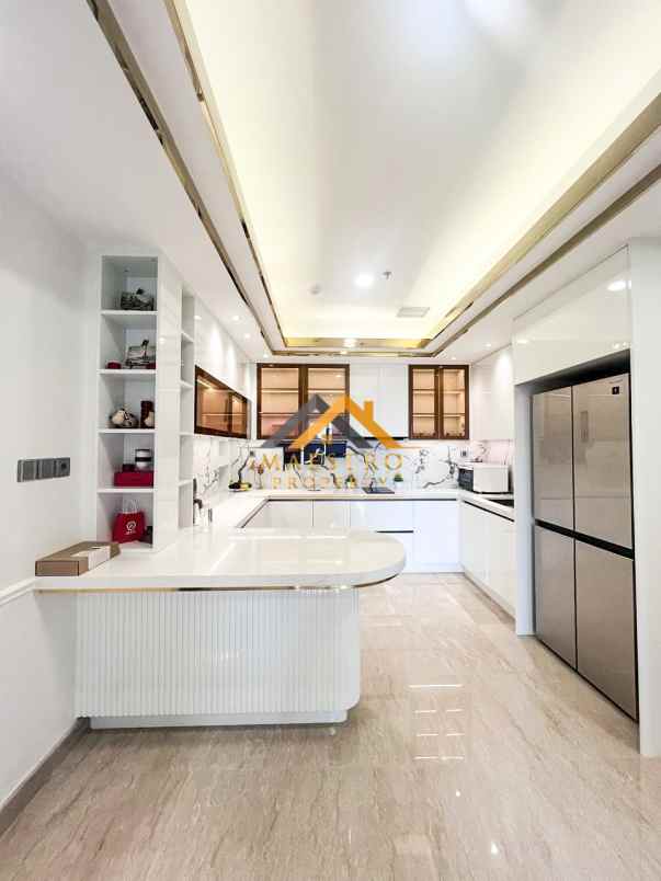 dijual apartemen podomoro city deli tower