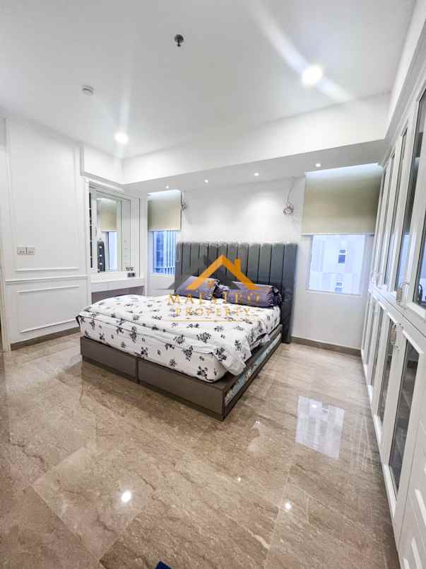 dijual apartemen podomoro city deli tower