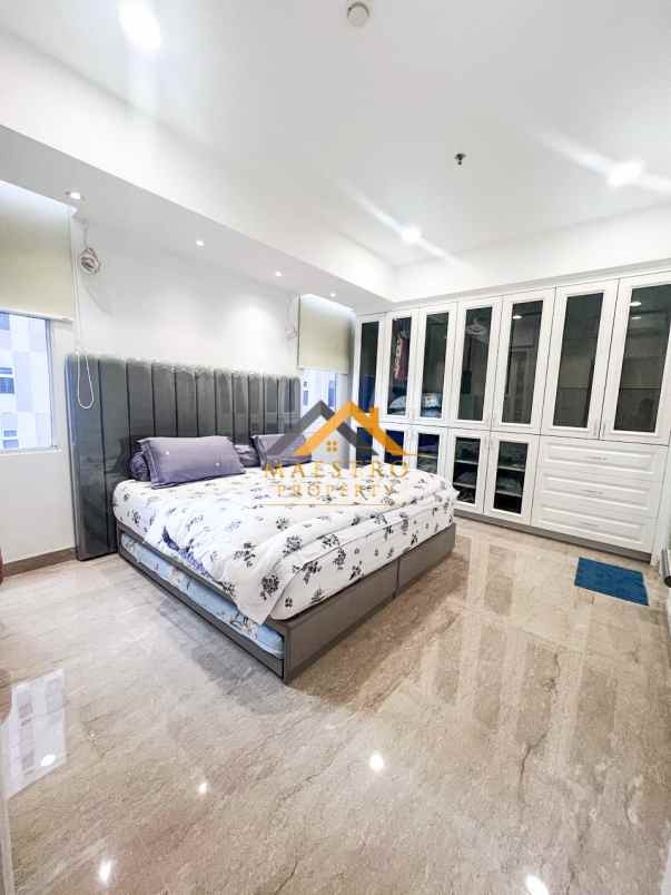 dijual apartemen podomoro city deli tower