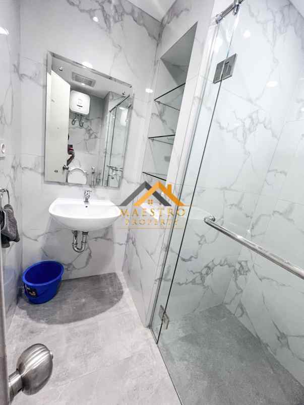 dijual apartemen podomoro city deli tower