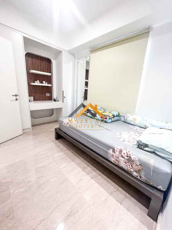 dijual apartemen podomoro city deli tower