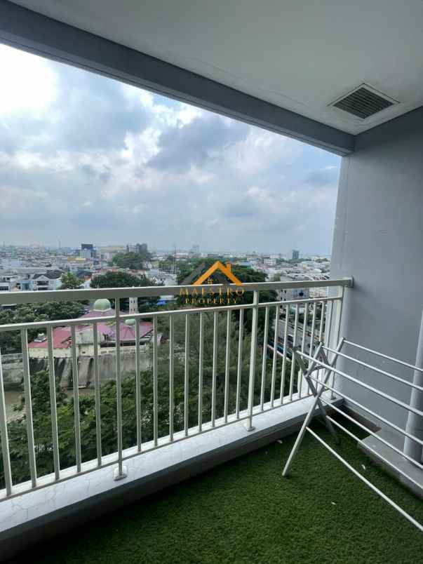 dijual apartemen podomoro city deli tower