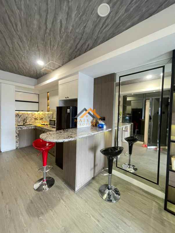 dijual apartemen podomoro city deli tower