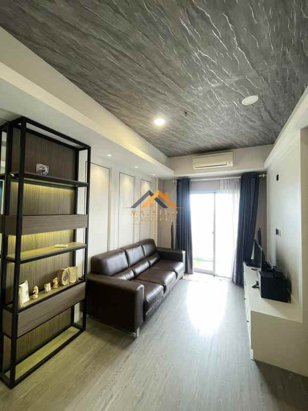 dijual apartemen podomoro city deli tower