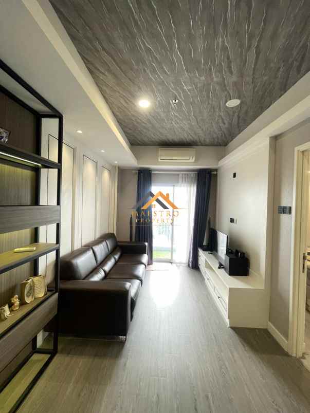 dijual apartemen podomoro city deli tower