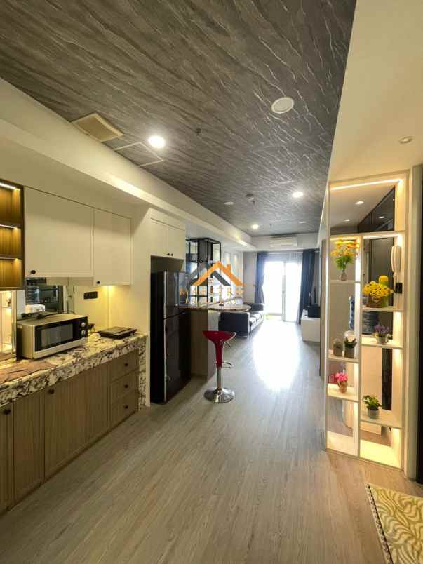 dijual apartemen podomoro city deli tower