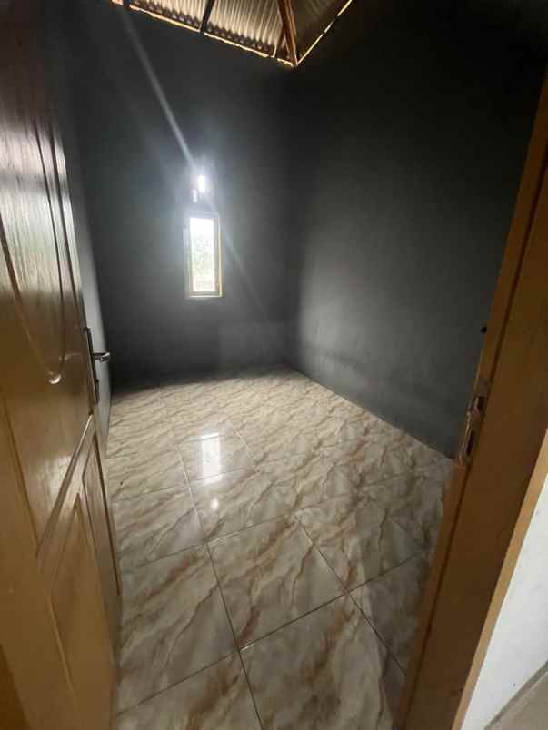 dijual cepat rumah 2 unit di jalan poros marawola